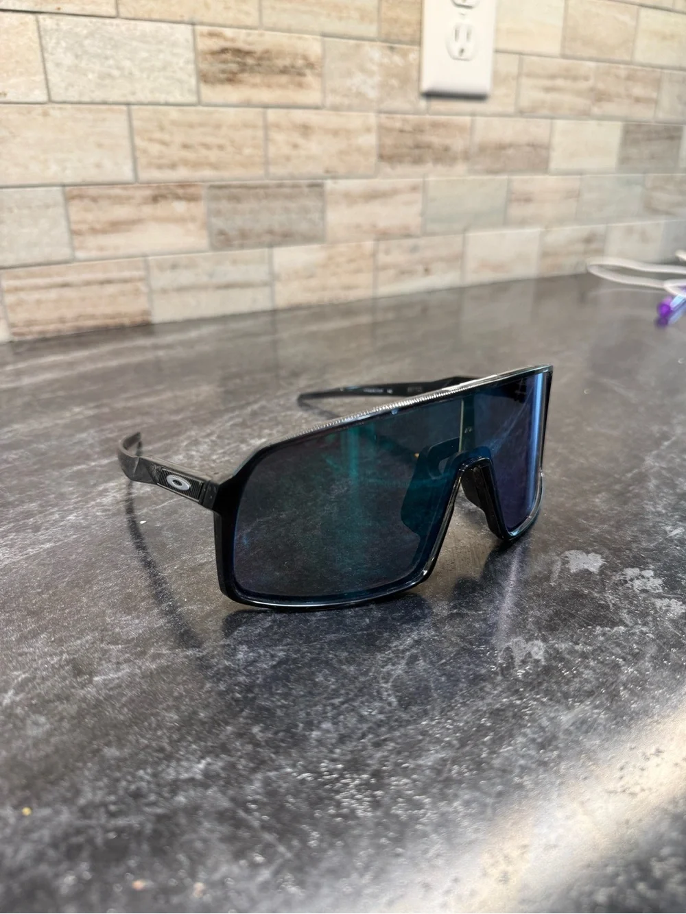 Oakley Matte Black Shield Sunglasses with Blue-Green Mirror Lenses
